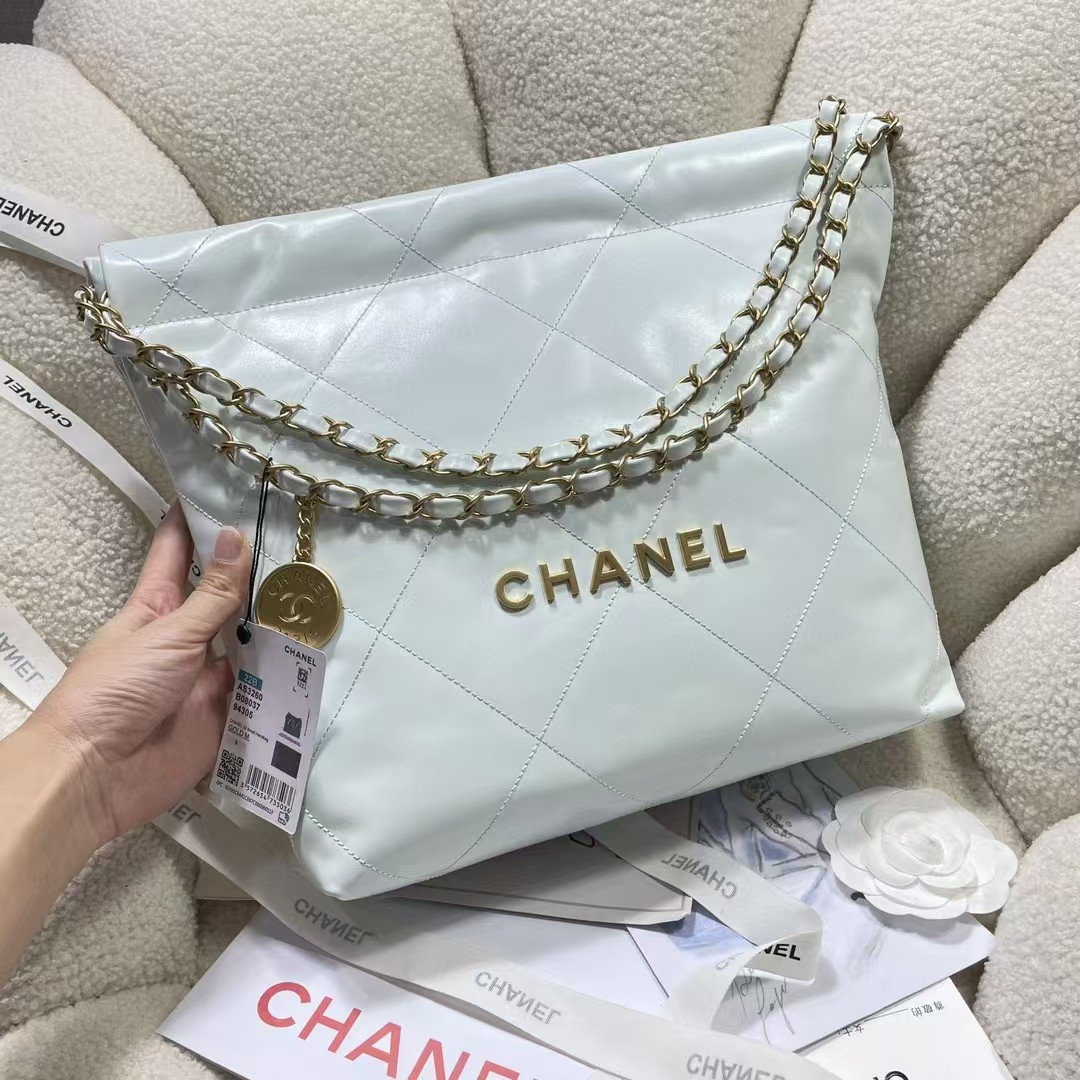 CHANEL 22 SMALL HANDBAG Shiny Calfskin Light Blue 37X35X7cm