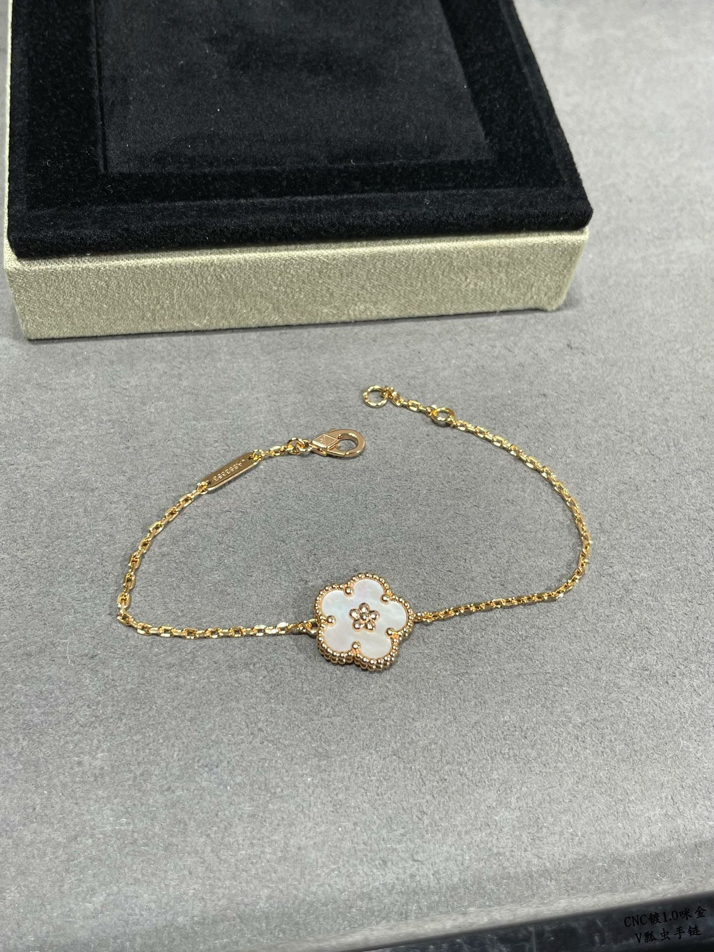 Van Cleef & Arpels plum blossom bracelet