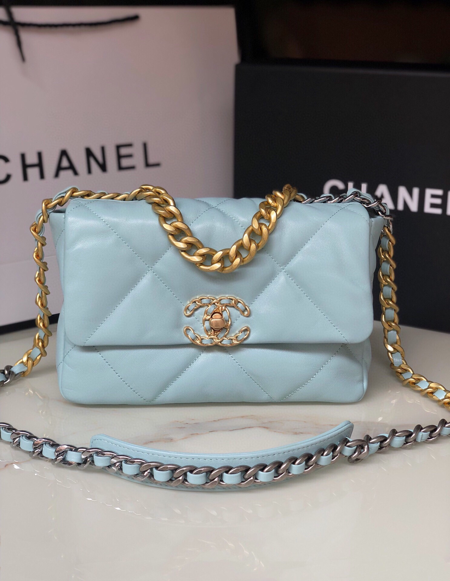 CHANEL 19 HANDBAG Shiny Leather, Gold-Tone, Silver-Tone & Ruthenium-Finish Metal Light Blue 6.2 × 10.1 × 3.5 in