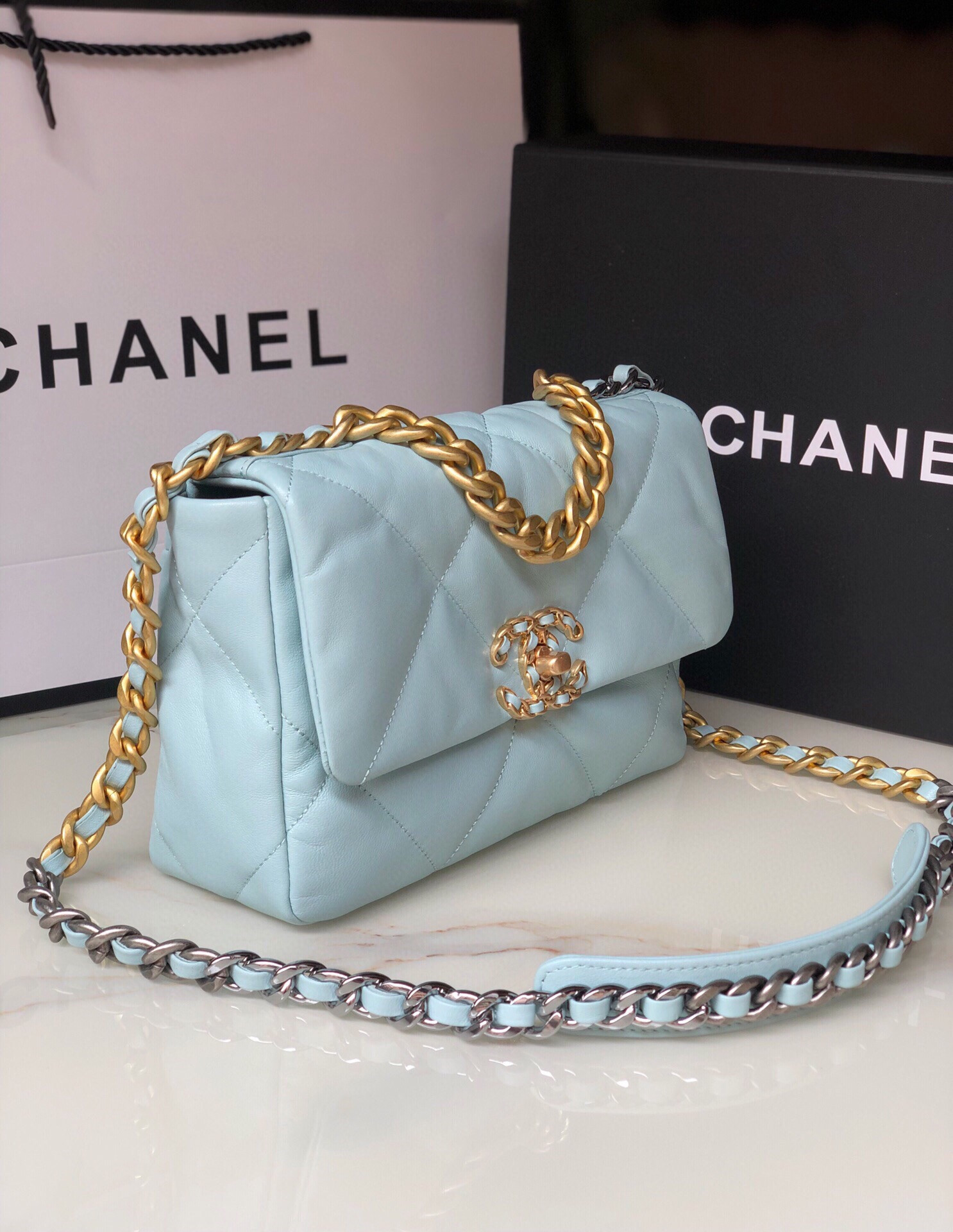 CHANEL 19 HANDBAG Shiny Leather, Gold-Tone, Silver-Tone & Ruthenium-Finish Metal Light Blue 6.2 × 10.1 × 3.5 in