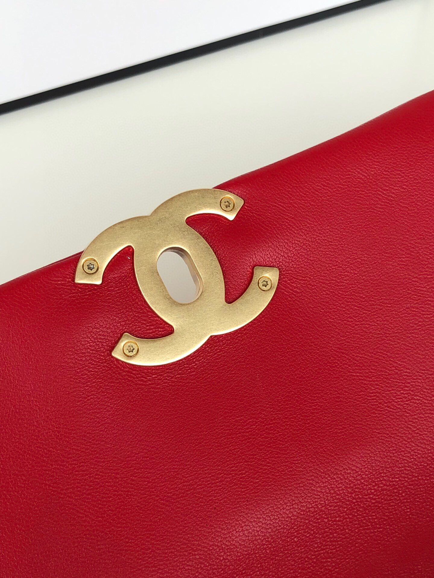 CHANEL 19 HANDBAG Shiny Leather, Gold-Tone, Silver-Tone & Ruthenium-Finish Metal Red 6.2 × 10.1 × 3.5 in