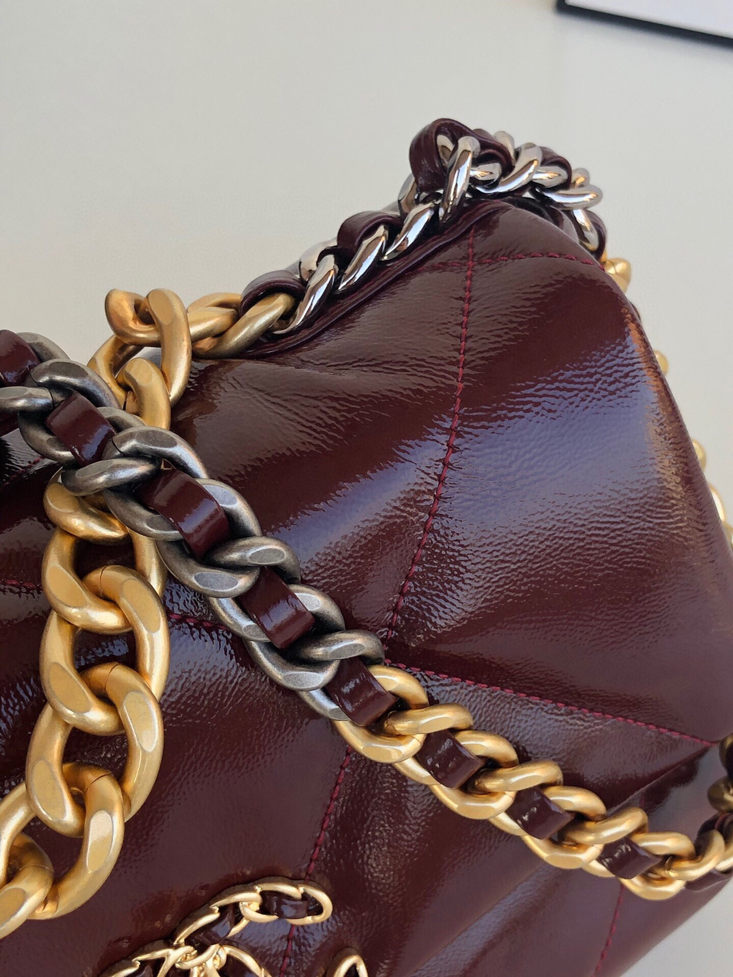 CHANEL 19 HANDBAG Shiny Leather, Gold-Tone, Silver-Tone & Ruthenium-Finish Metal Dark Red 6.2 × 10.1 × 3.5 in