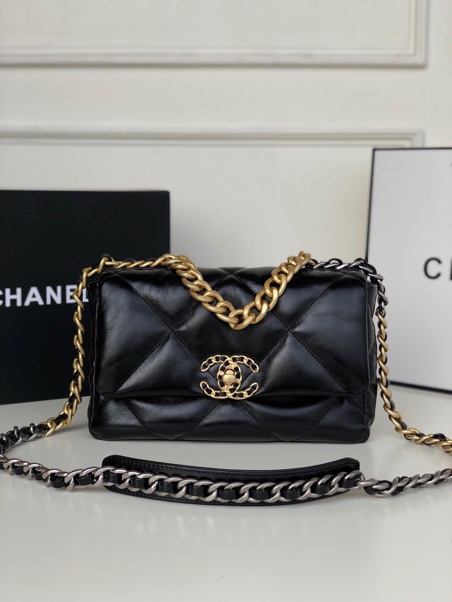 CHANEL 19 HANDBAG Shiny Leather, Gold-Tone, Silver-Tone & Ruthenium-Finish Metal Black 6.2 × 10.1 × 3.5 in