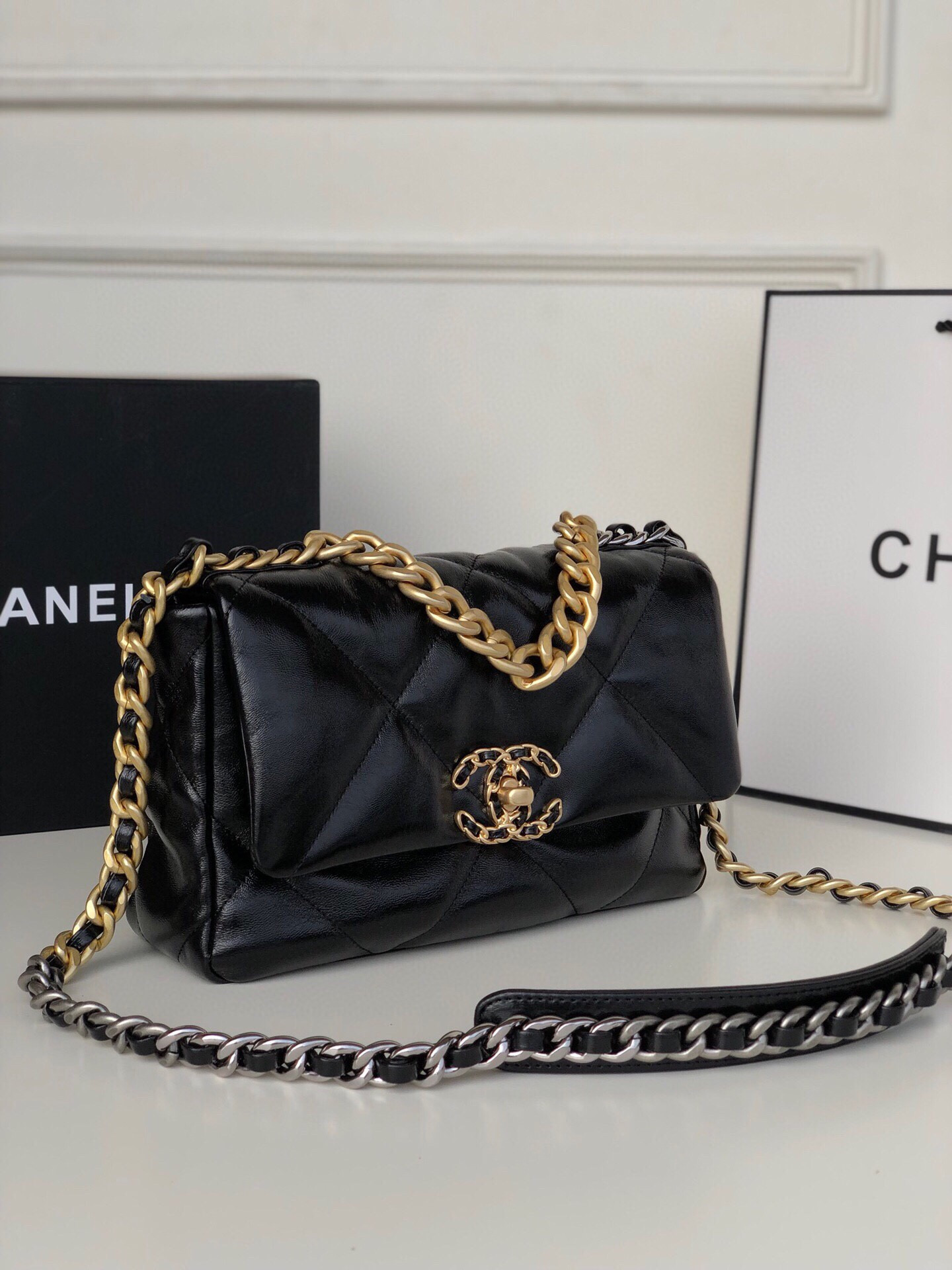CHANEL 19 HANDBAG Shiny Leather, Gold-Tone, Silver-Tone & Ruthenium-Finish Metal Black 6.2 × 10.1 × 3.5 in
