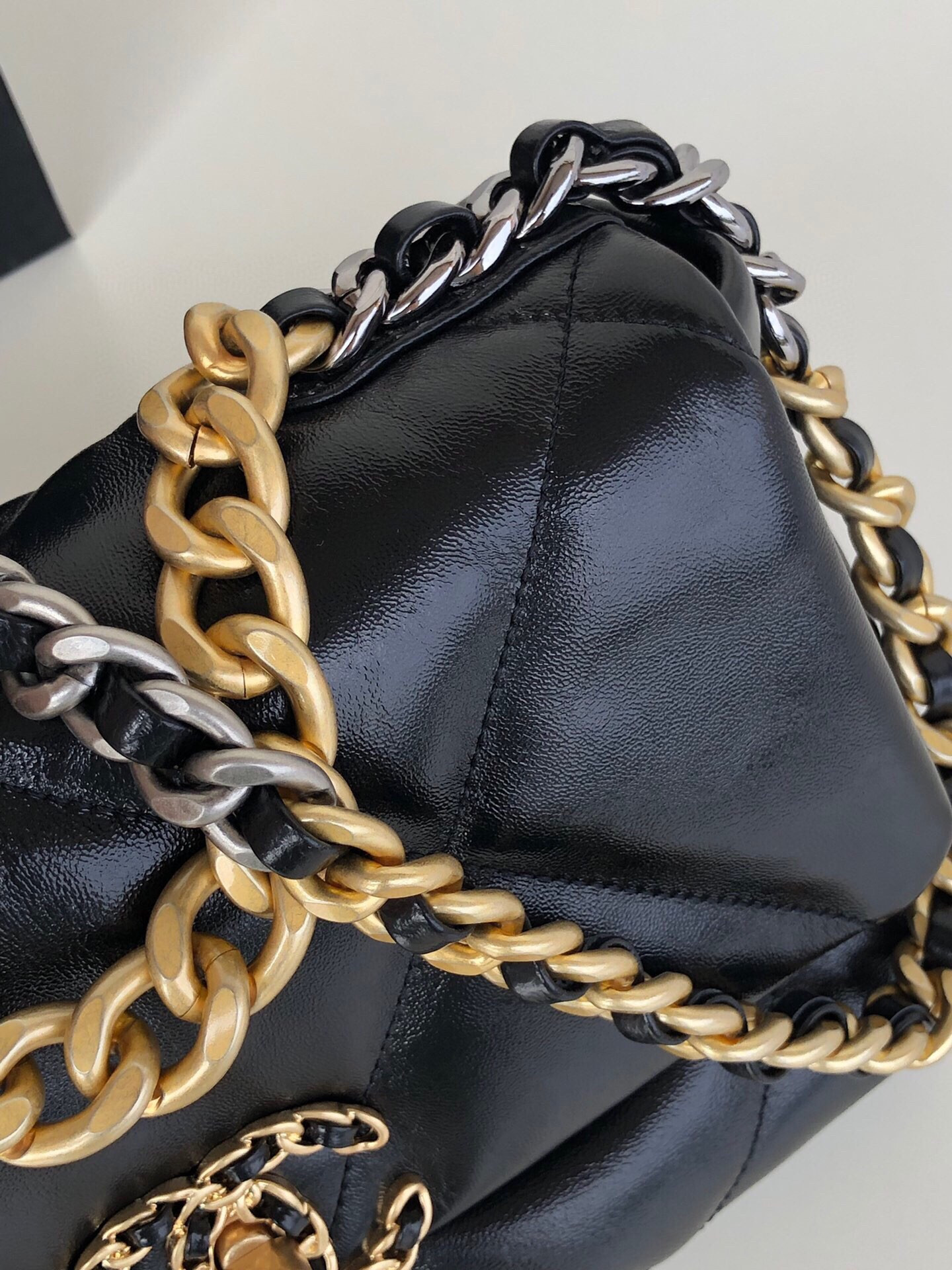 CHANEL 19 HANDBAG Shiny Leather, Gold-Tone, Silver-Tone & Ruthenium-Finish Metal Black 6.2 × 10.1 × 3.5 in