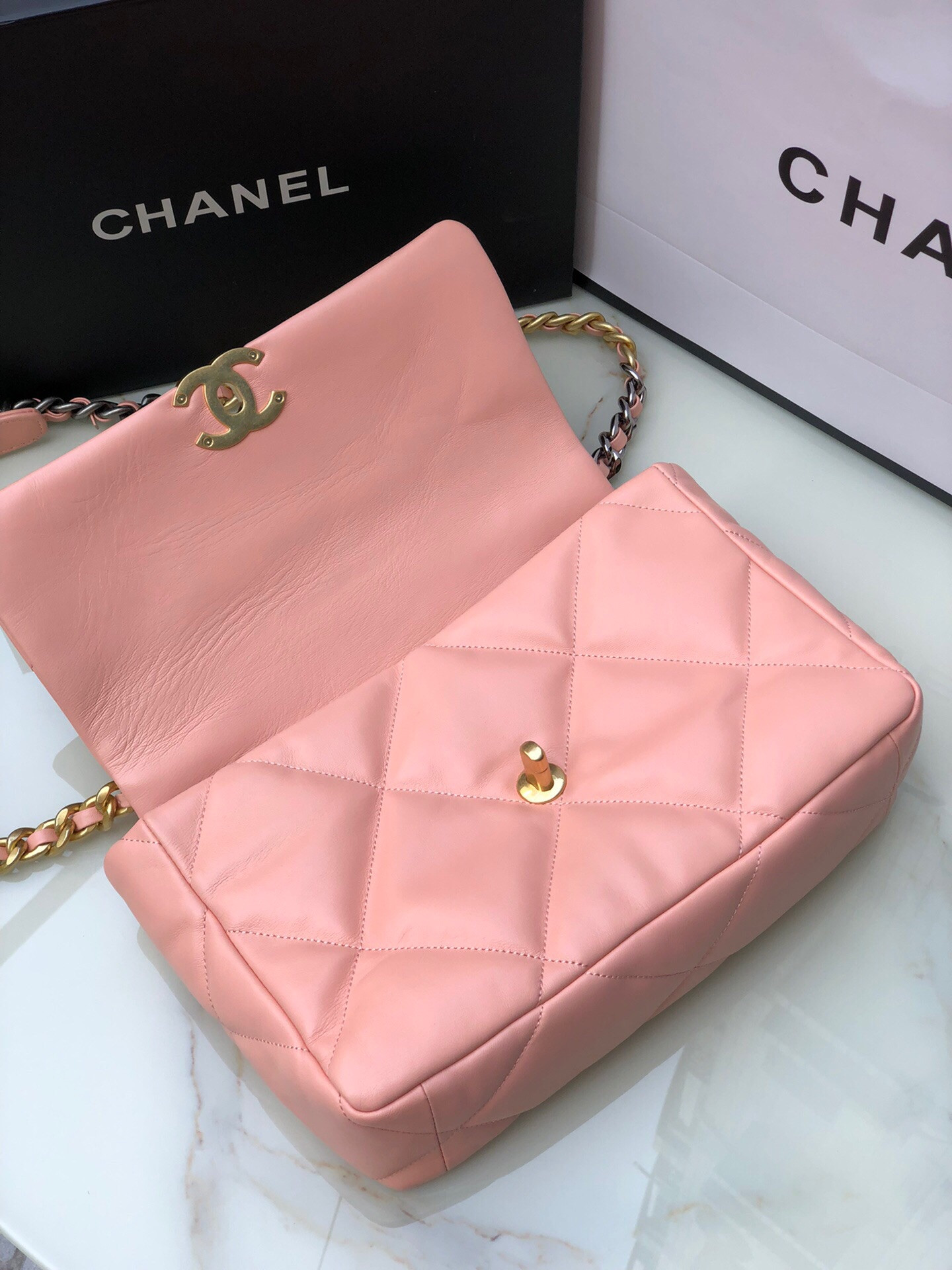 CHANEL 19 LARGE HANDBAG Shiny Leather, Gold-Tone, Silver-Tone & Ruthenium-Finish Metal Light Pink 7.8 × 11.7 × 3.9 in