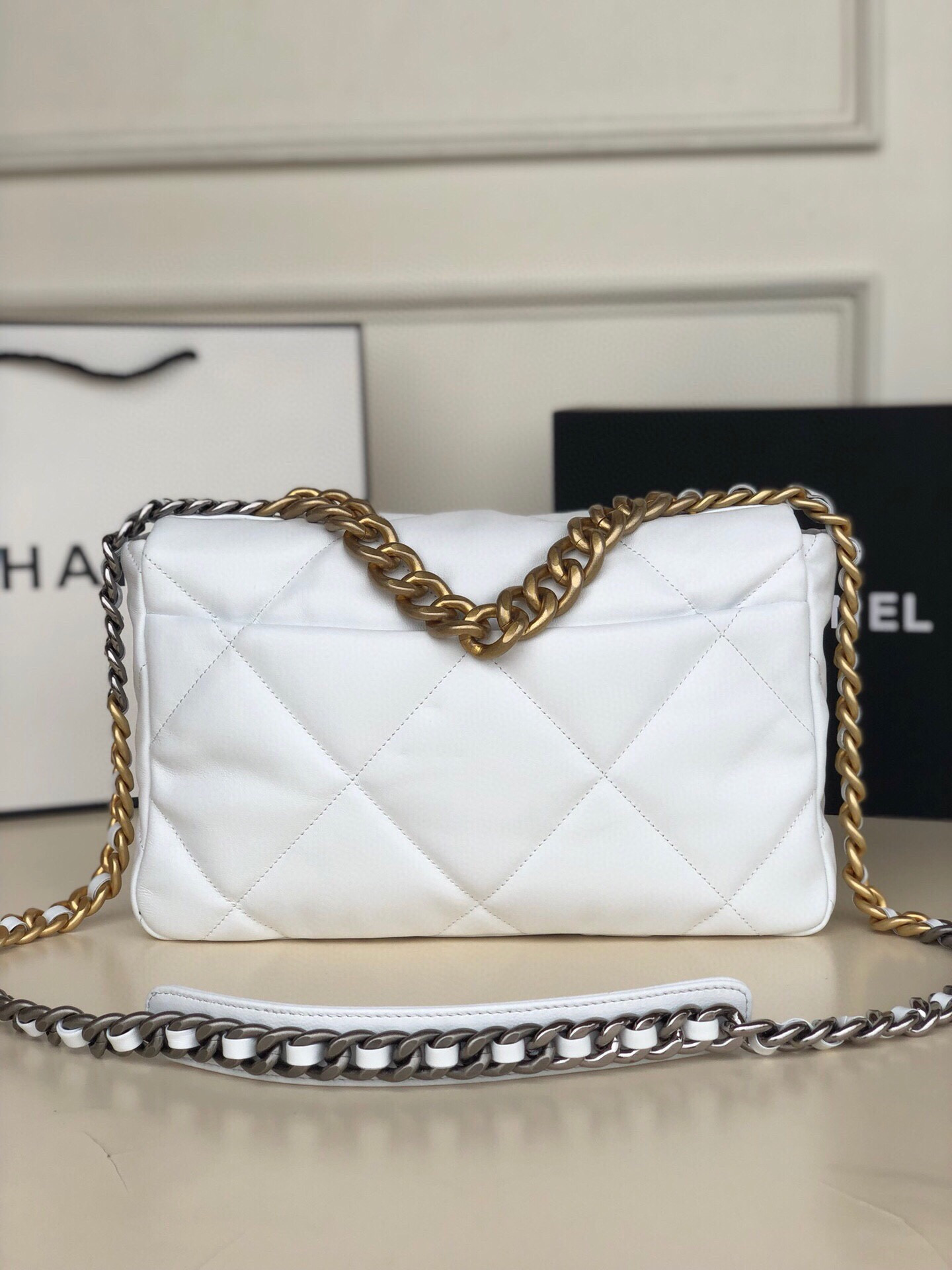 CHANEL 19 LARGE HANDBAG Shiny Leather, Gold-Tone, Silver-Tone & Ruthenium-Finish Metal White 7.8 × 11.7 × 3.9 in