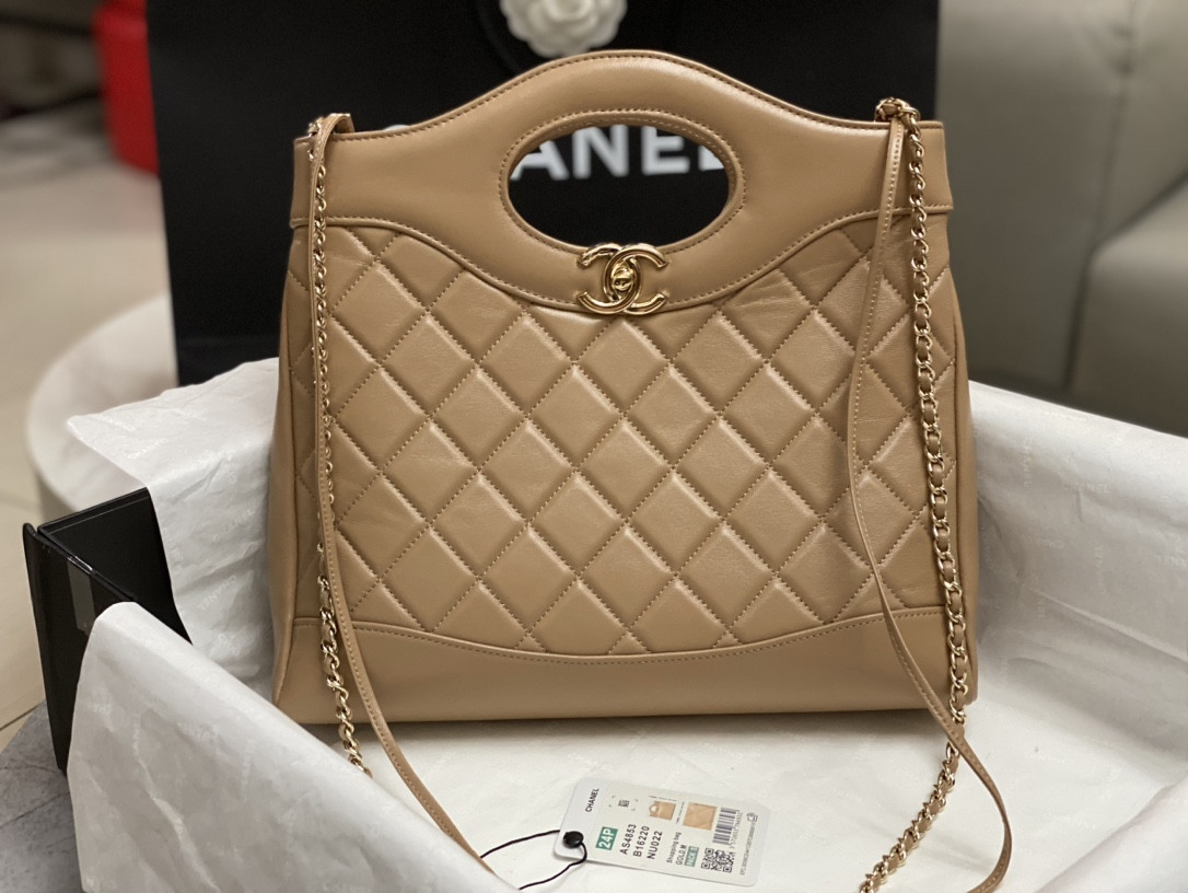 CHANEL SHOPPING BAG Shiny Lambskin & Gold-Tone Metal 11.7 × 11.3 × 3.5 in
