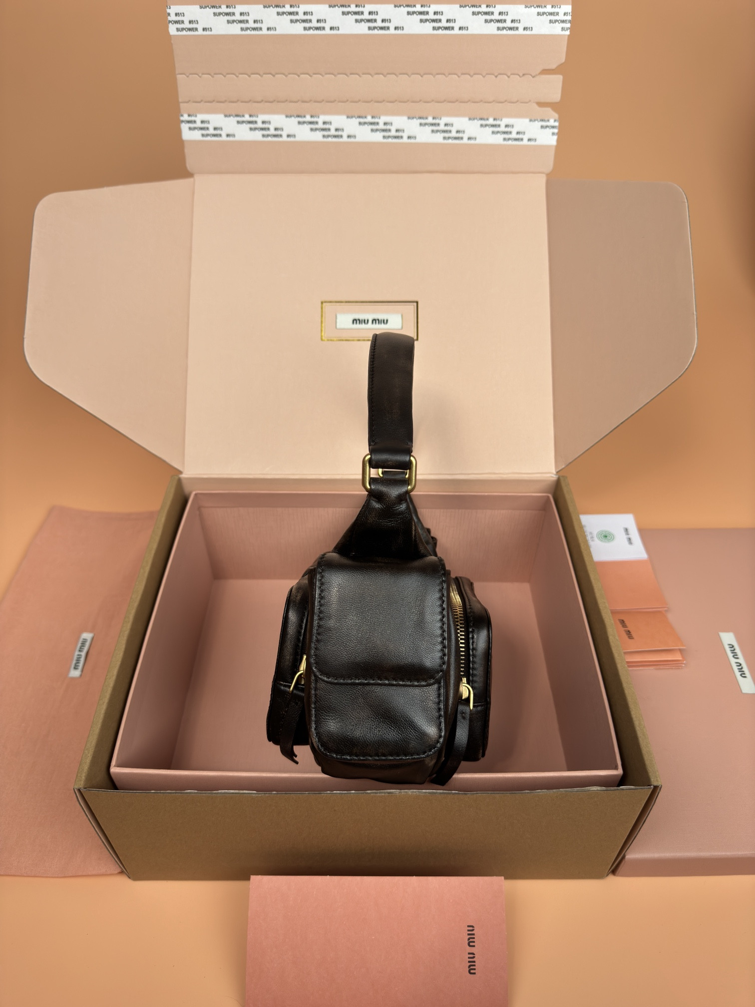 Miu Miu Hobo Nappa leather pocket bag 12x21x6cm